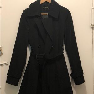 Black waterproof trench by Calvin Klein